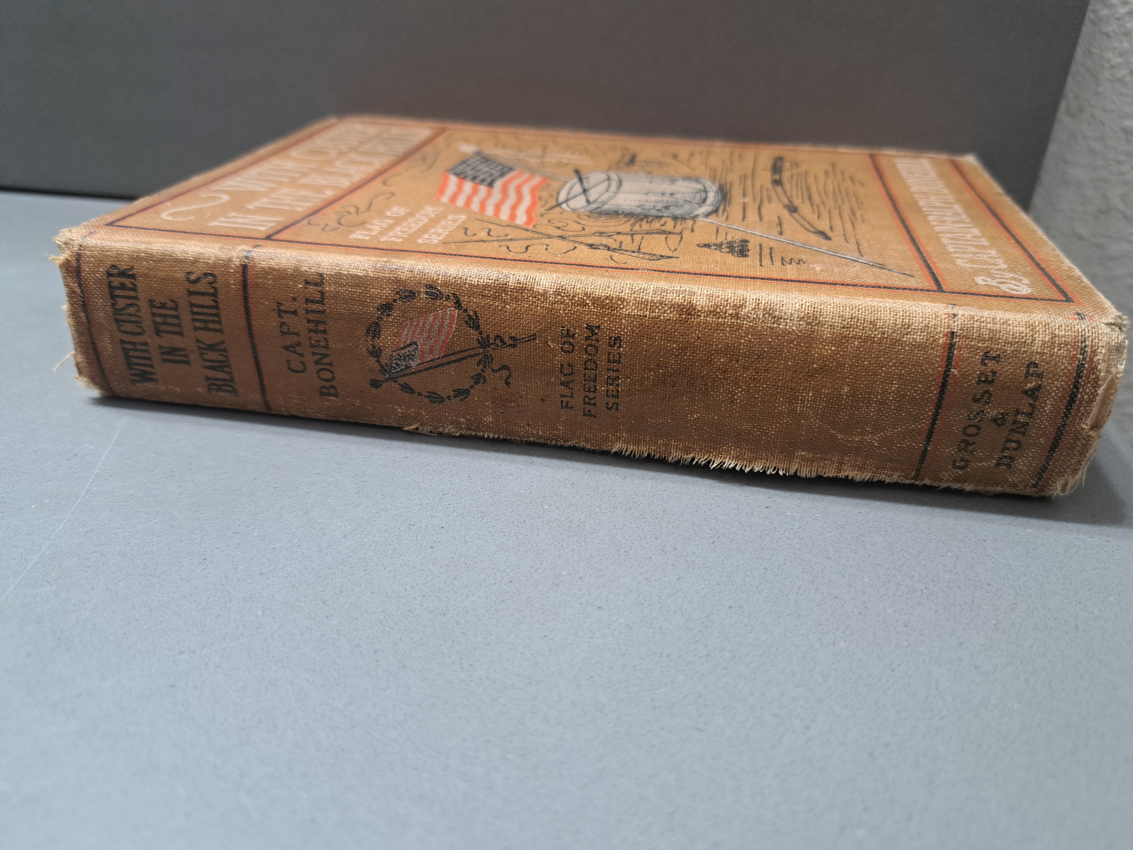 Vintage 1903 edition of With Custer in the Black Hills - A Flag of Freedom Series by Captain Ralph Bonehill
