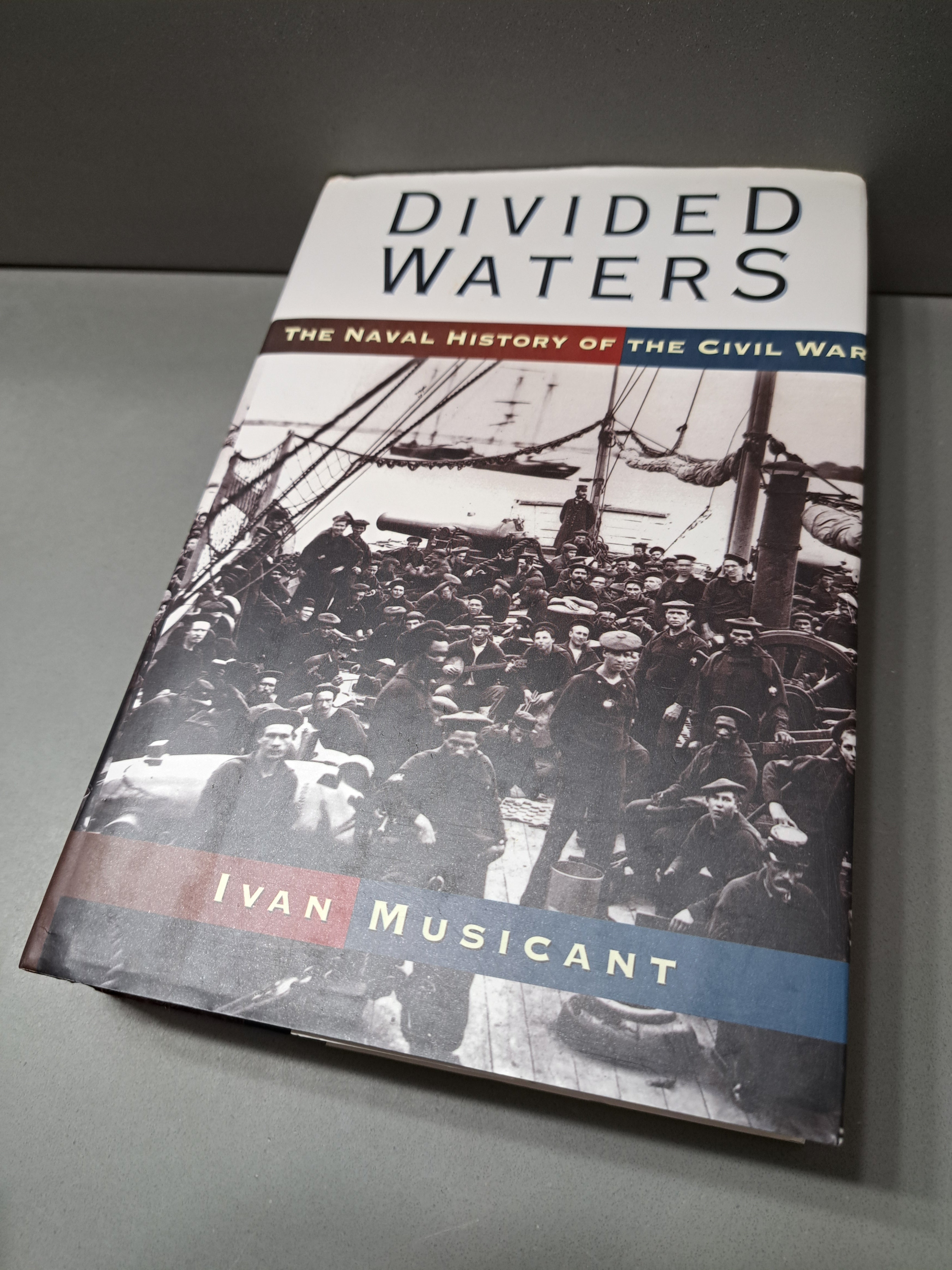 1995 first edition of Divided Waters: The Naval History of the Civil War by Ivan Musicant