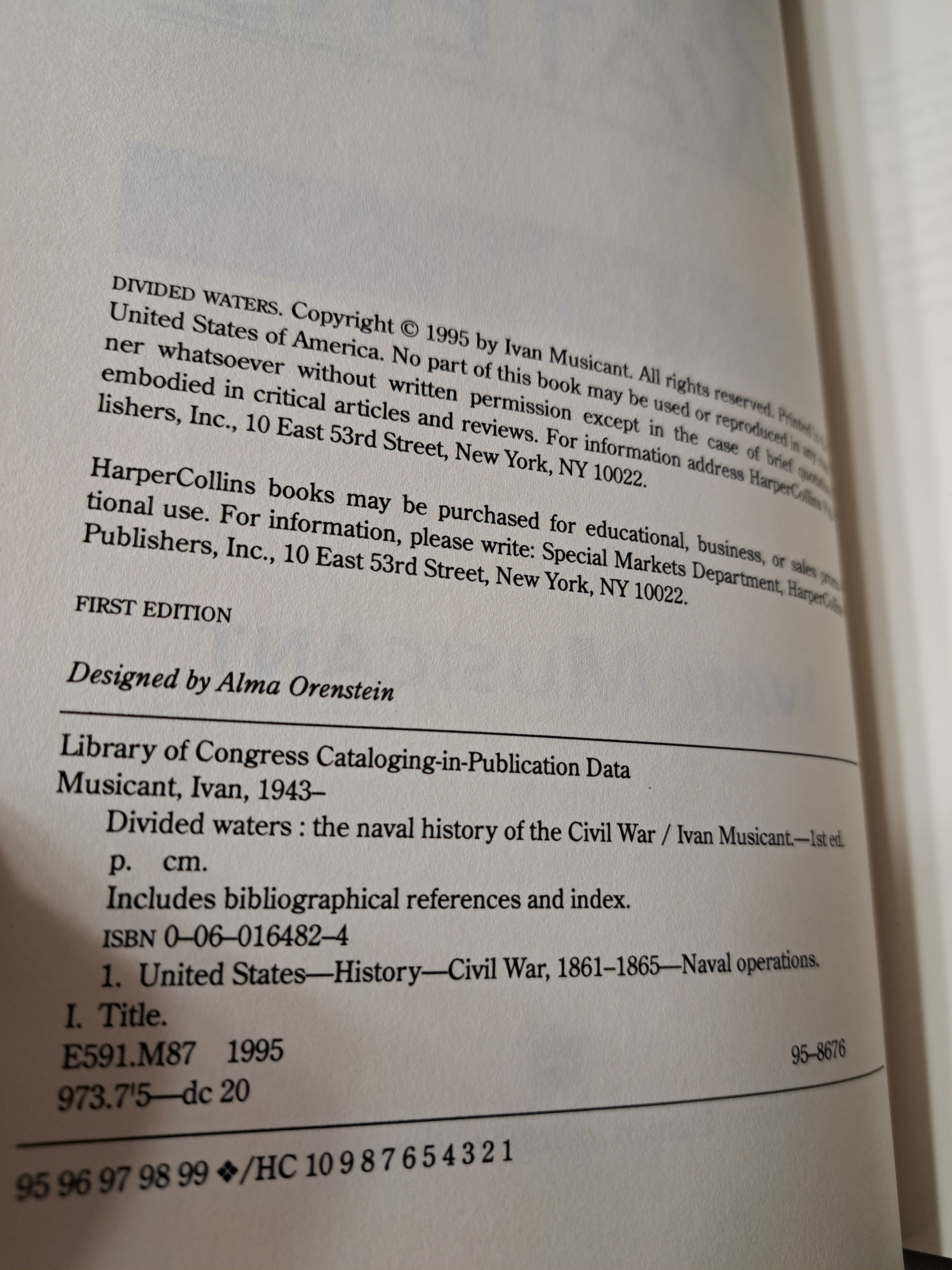 1995 first edition of Divided Waters: The Naval History of the Civil War by Ivan Musicant