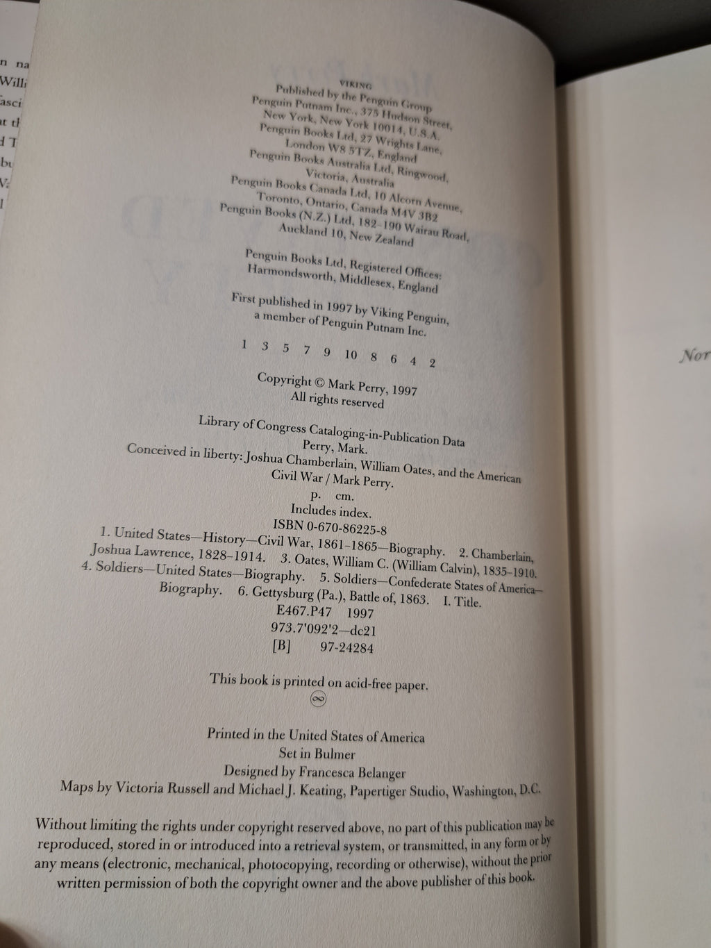 1997 first edition of Conceived in Liberty by Mark Perry