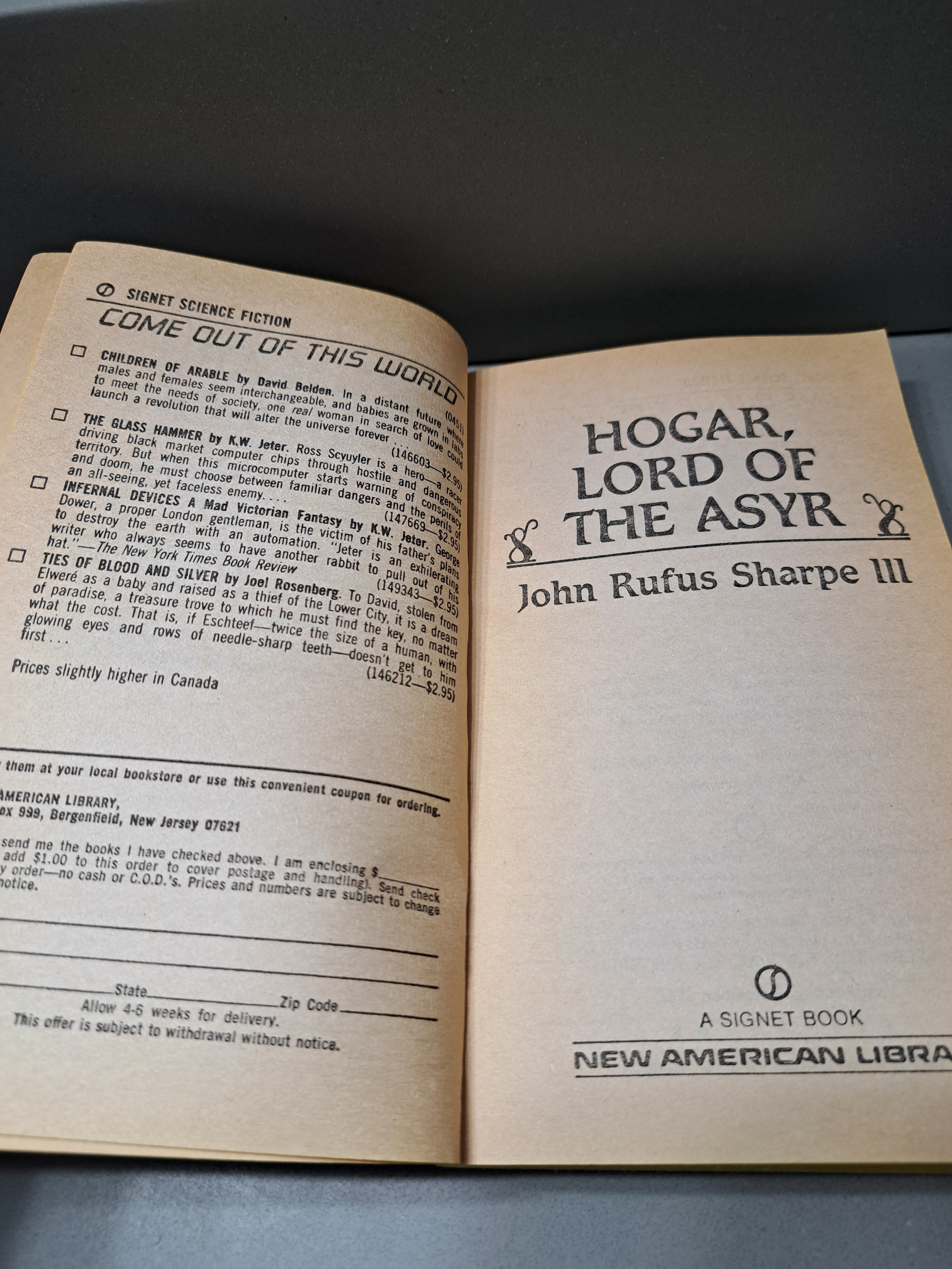 Vintage 1987 first edition of Hogar, Lord of the Asyr by John Rufus Sharpe III