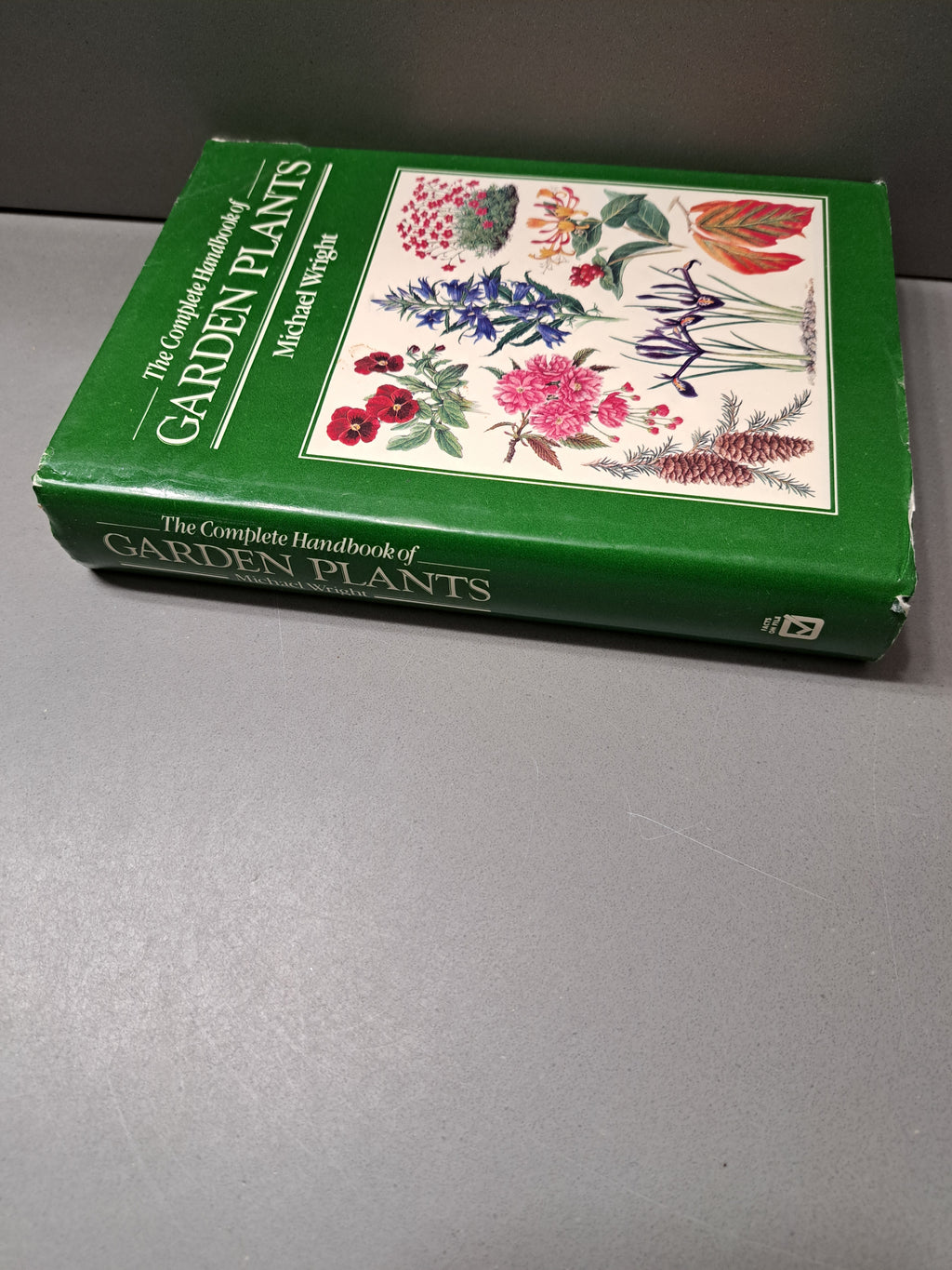 Vintage 1984 first edition of The Complete Handbook of Garden Plants by Michael Wright